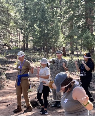 People playing games in the forest