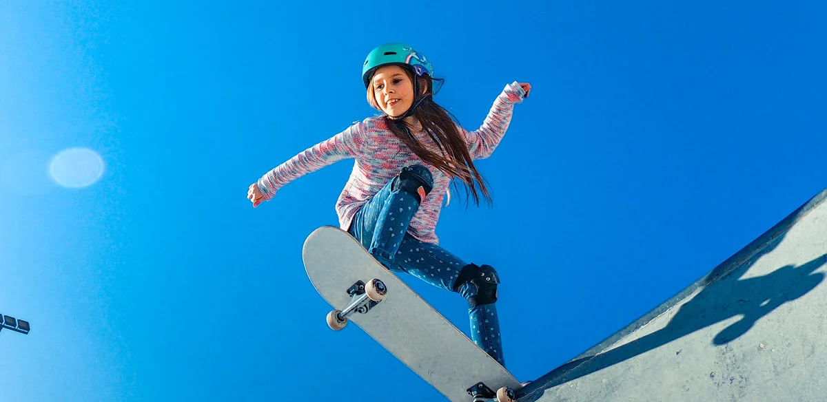 Stuedent with her skate board